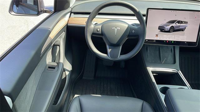 used 2025 Tesla Model Y car, priced at $39,977
