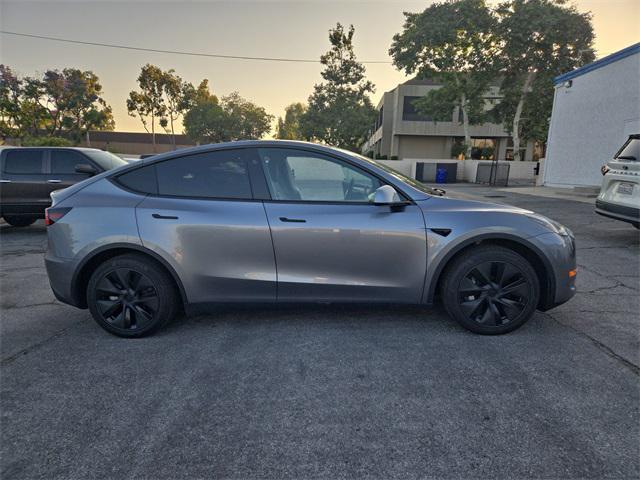 used 2025 Tesla Model Y car, priced at $39,977