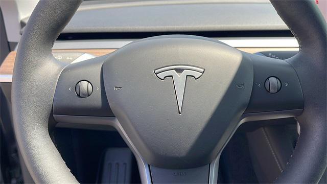used 2025 Tesla Model Y car, priced at $39,977