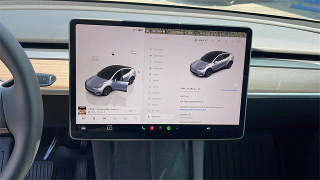 used 2025 Tesla Model Y car, priced at $39,977