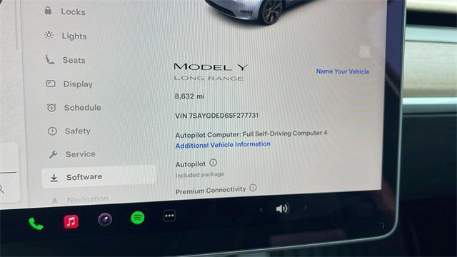 used 2025 Tesla Model Y car, priced at $39,977