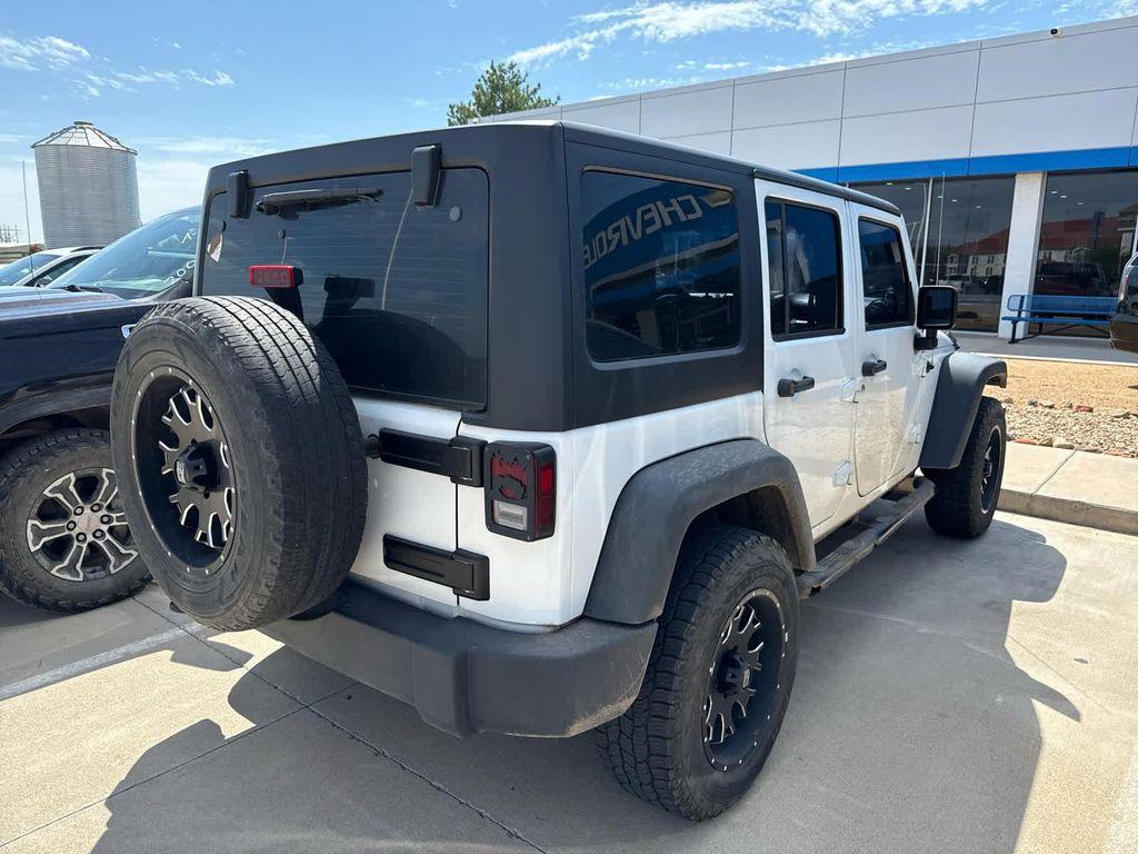 used 2014 Jeep Wrangler Unlimited car, priced at $17,994