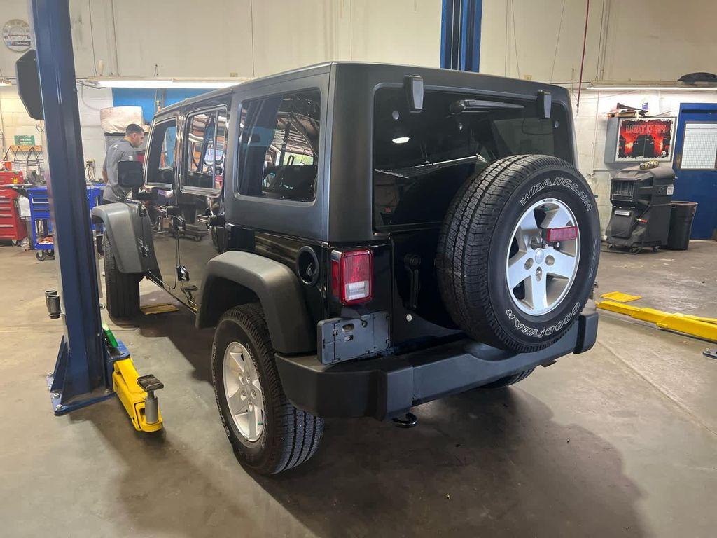used 2017 Jeep Wrangler Unlimited car, priced at $28,039