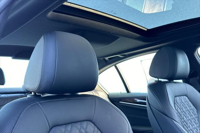 used 2023 BMW 530e car, priced at $35,700