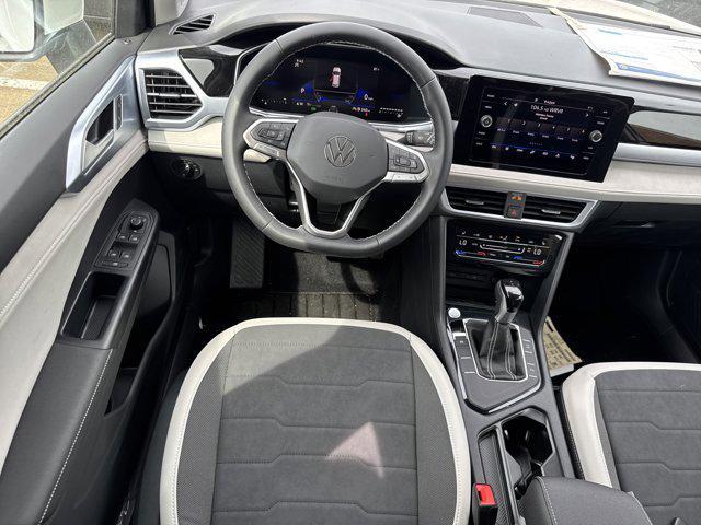 new 2025 Volkswagen Taos car, priced at $27,704