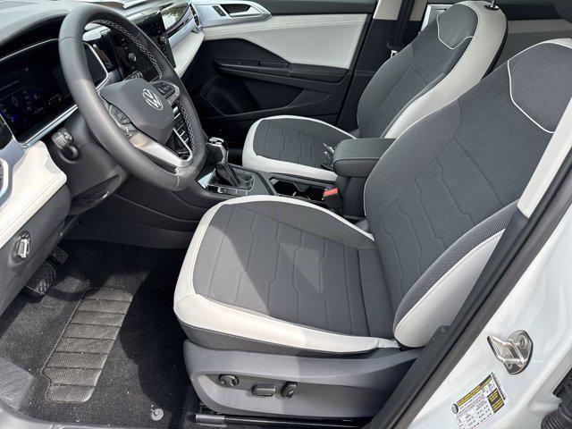 new 2025 Volkswagen Taos car, priced at $27,704
