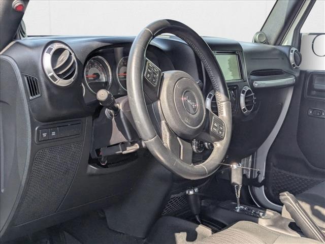 used 2012 Jeep Wrangler Unlimited car, priced at $15,798