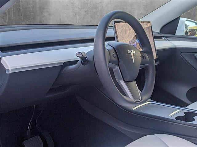 used 2024 Tesla Model Y car, priced at $35,041