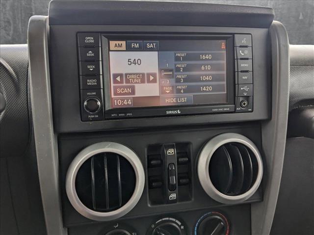 used 2010 Jeep Wrangler Unlimited car, priced at $10,798