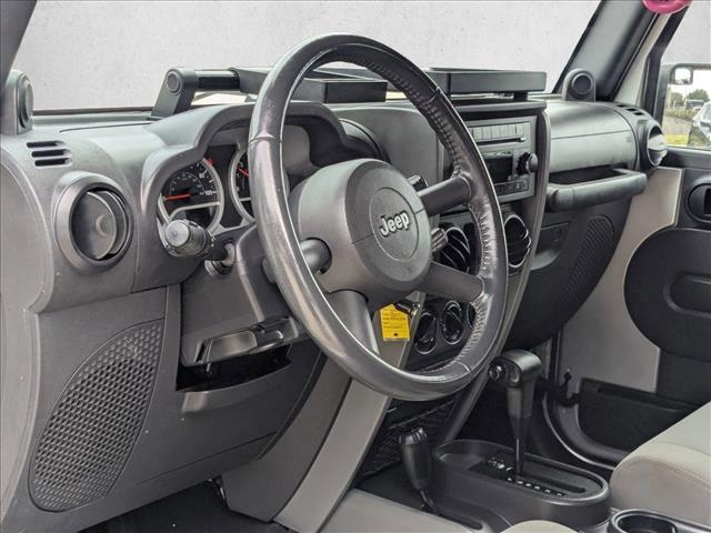 used 2010 Jeep Wrangler Unlimited car, priced at $13,598