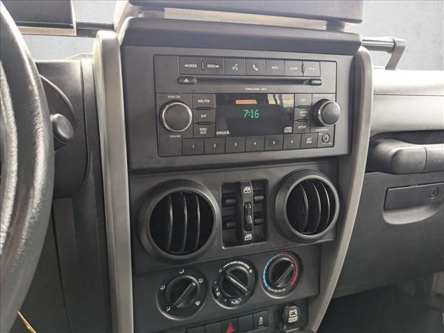 used 2010 Jeep Wrangler Unlimited car, priced at $13,598