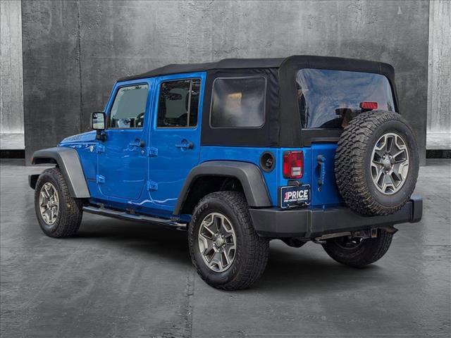 used 2015 Jeep Wrangler Unlimited car, priced at $16,998