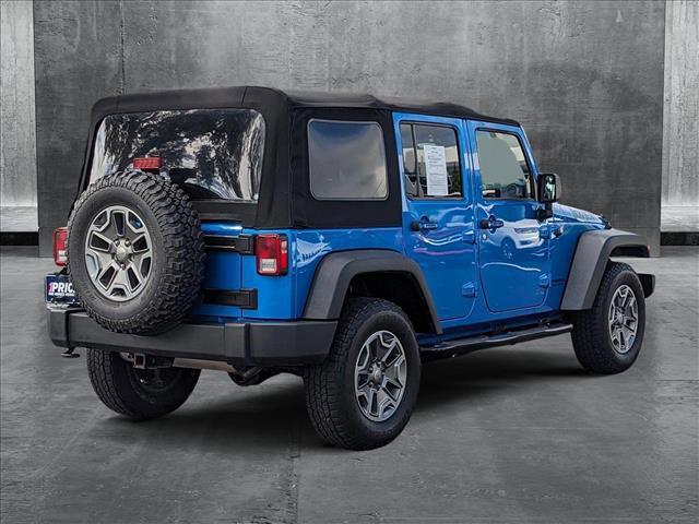 used 2015 Jeep Wrangler Unlimited car, priced at $16,998