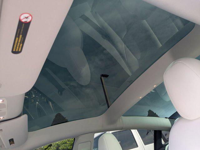 used 2023 Tesla Model 3 car, priced at $26,517