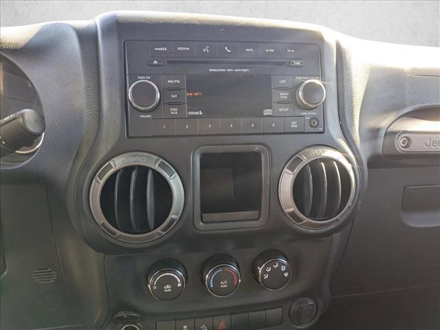 used 2014 Jeep Wrangler Unlimited car, priced at $12,998