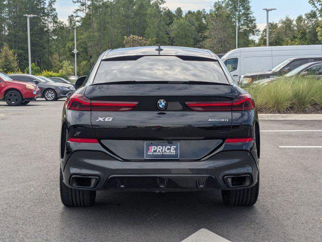 used 2023 BMW X6 car, priced at $59,998