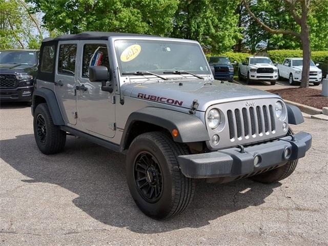 used 2015 Jeep Wrangler Unlimited car, priced at $23,711