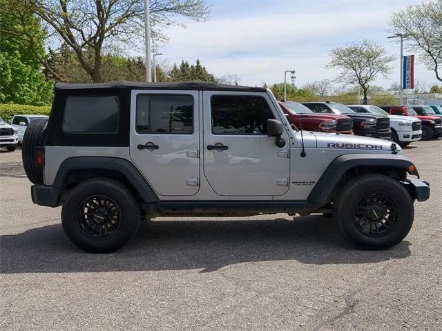 used 2015 Jeep Wrangler Unlimited car, priced at $23,711