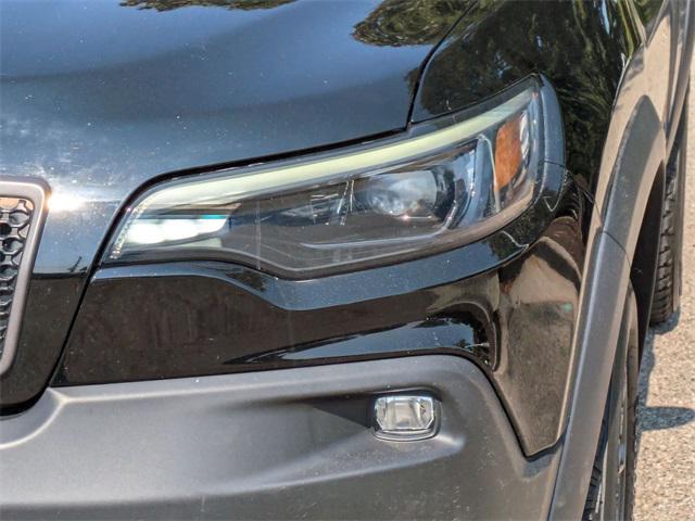 used 2021 Jeep Cherokee car, priced at $22,515