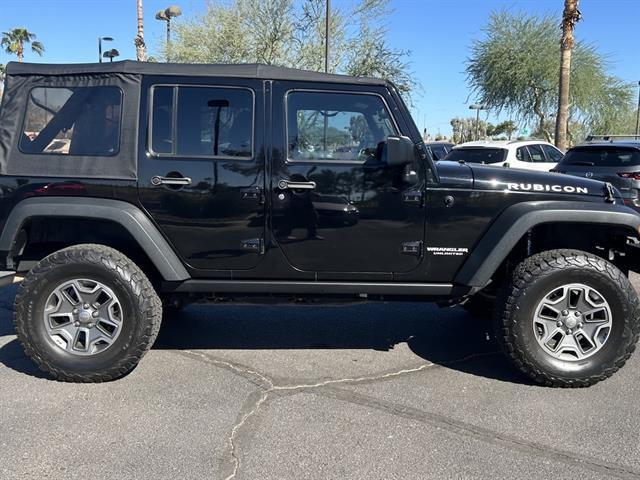 used 2015 Jeep Wrangler Unlimited car, priced at $25,999