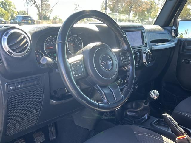 used 2015 Jeep Wrangler Unlimited car, priced at $25,999