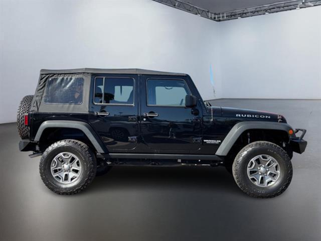 used 2015 Jeep Wrangler Unlimited car, priced at $22,999