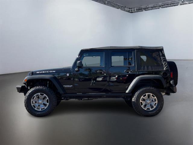 used 2015 Jeep Wrangler Unlimited car, priced at $22,999