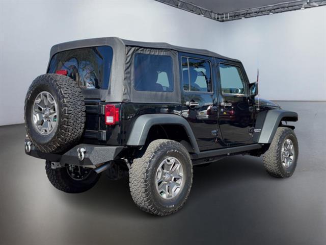 used 2015 Jeep Wrangler Unlimited car, priced at $22,999