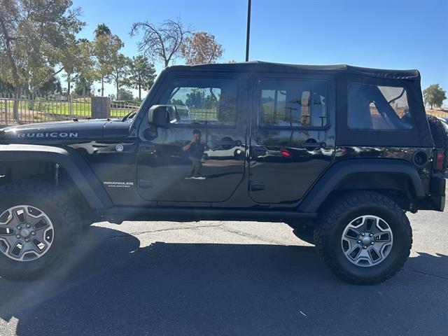 used 2015 Jeep Wrangler Unlimited car, priced at $25,999