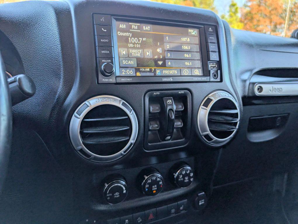 used 2013 Jeep Wrangler Unlimited car, priced at $16,987