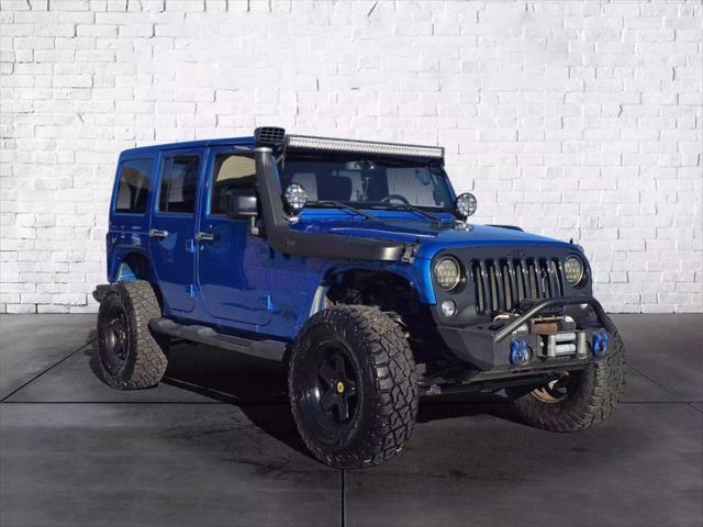 used 2014 Jeep Wrangler Unlimited car, priced at $17,788