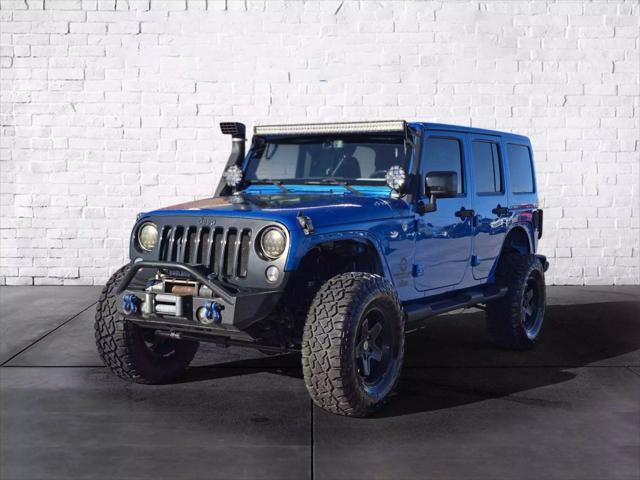 used 2014 Jeep Wrangler Unlimited car, priced at $17,788