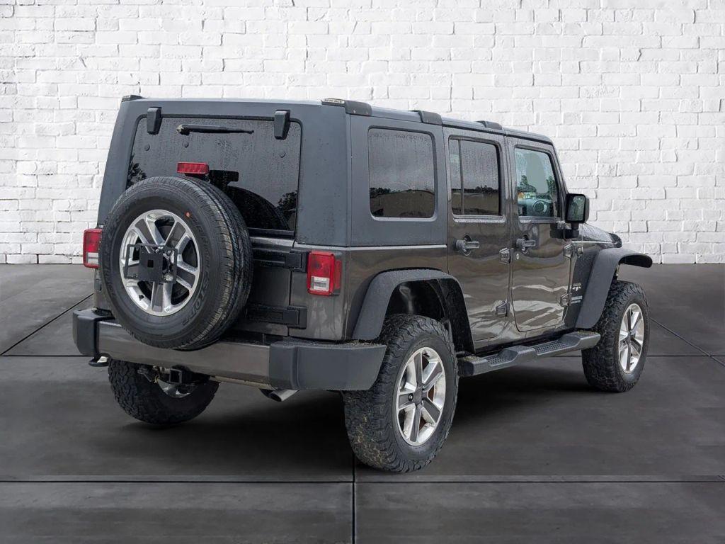 used 2016 Jeep Wrangler Unlimited car, priced at $15,397