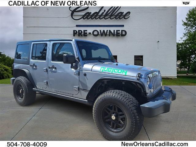 used 2014 Jeep Wrangler Unlimited car, priced at $21,919