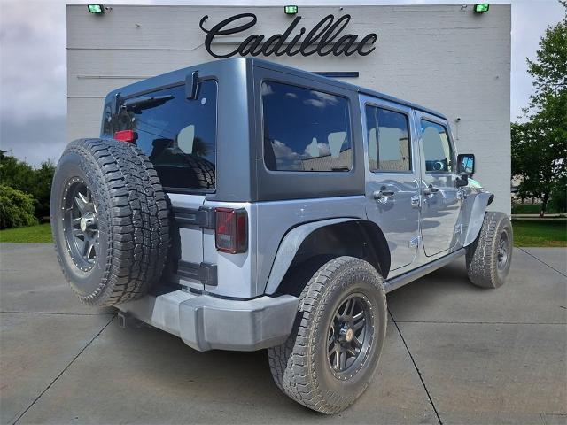 used 2014 Jeep Wrangler Unlimited car, priced at $21,919