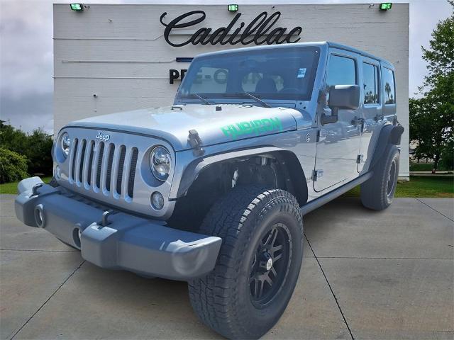 used 2014 Jeep Wrangler Unlimited car, priced at $21,919