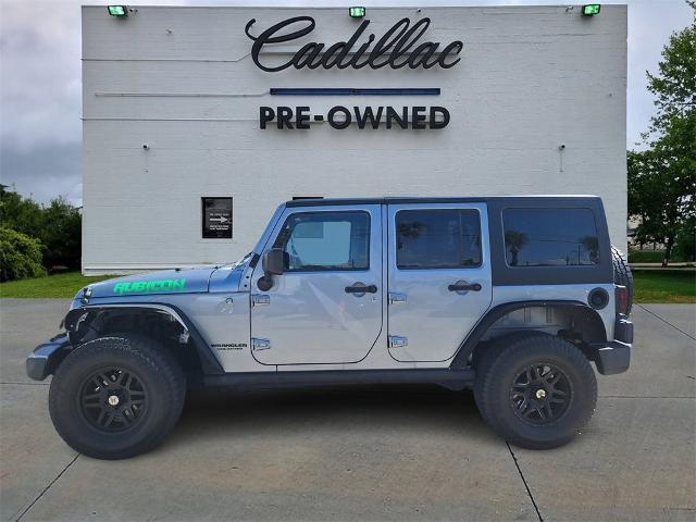 used 2014 Jeep Wrangler Unlimited car, priced at $21,919