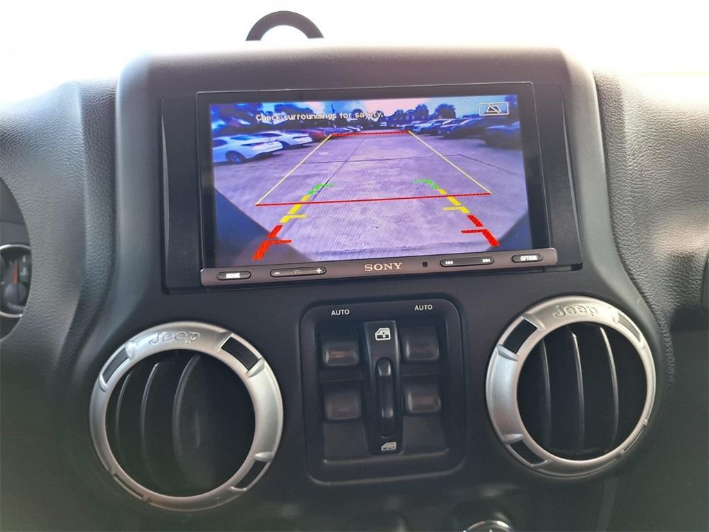 used 2016 Jeep Wrangler Unlimited car, priced at $28,702