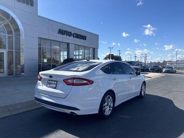 used 2015 Ford Fusion car, priced at $9,999