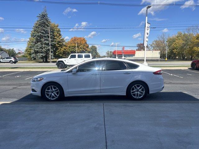 used 2015 Ford Fusion car, priced at $9,999