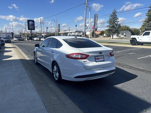 used 2015 Ford Fusion car, priced at $9,999