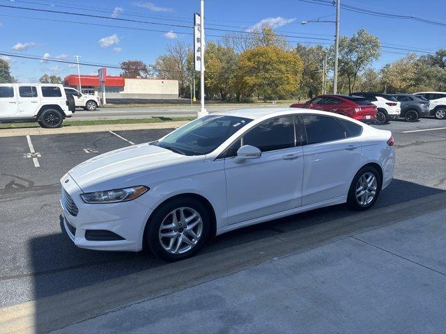 used 2015 Ford Fusion car, priced at $9,999