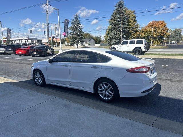 used 2015 Ford Fusion car, priced at $9,999