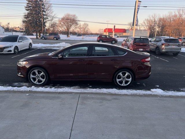 used 2016 Ford Fusion car, priced at $7,300