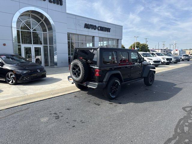 used 2021 Jeep Wrangler Unlimited car, priced at $27,655