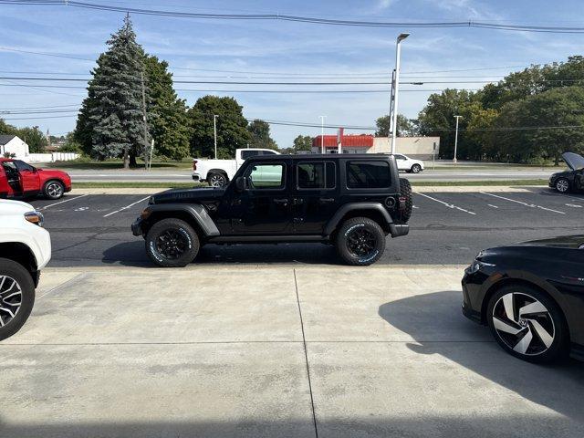 used 2021 Jeep Wrangler Unlimited car, priced at $27,655