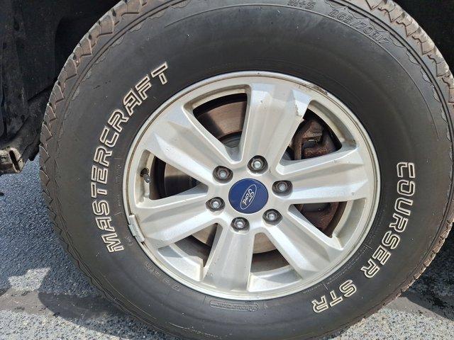 used 2015 Ford F-150 car, priced at $13,500
