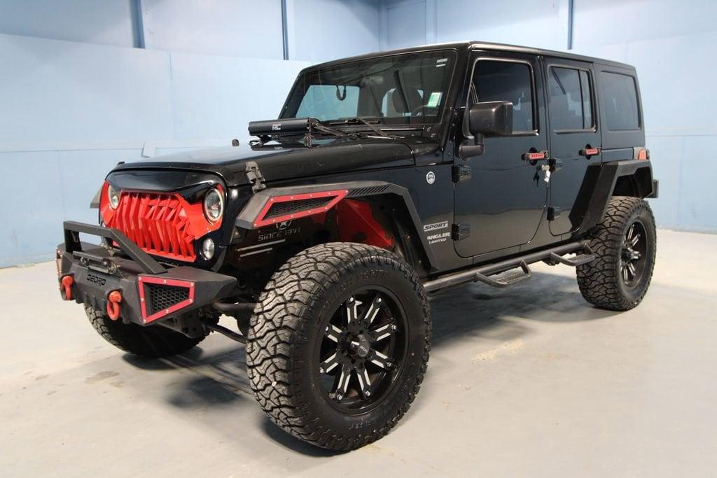 used 2016 Jeep Wrangler Unlimited car, priced at $16,991