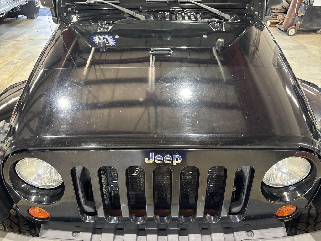 used 2013 Jeep Wrangler Unlimited car, priced at $13,999