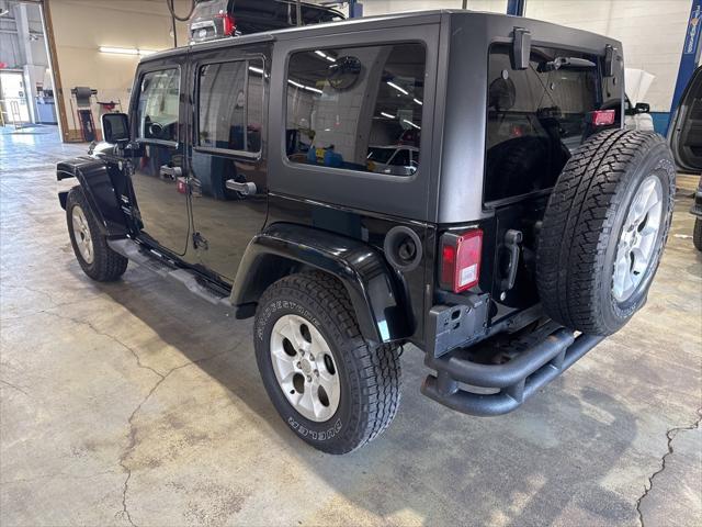 used 2013 Jeep Wrangler Unlimited car, priced at $15,987